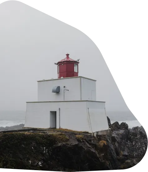 A lighthouse on a rocky outcrop